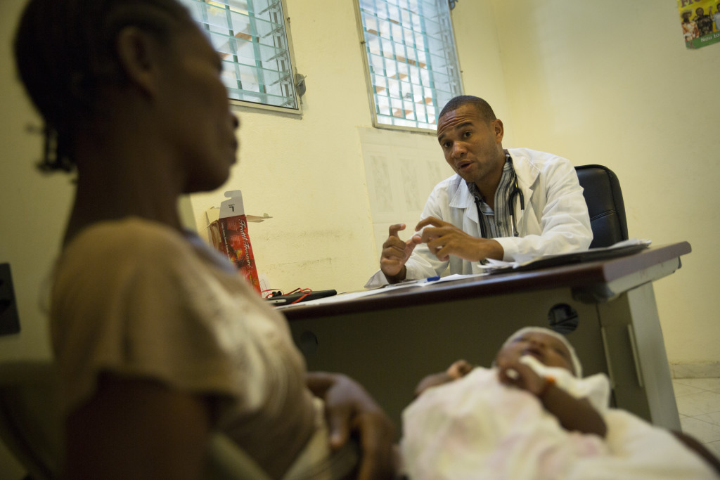 Dr. Cadet Atsaly sees patients at the hospital in Port-á-Piment, Haiti. (Photo By: Garrett Hubbard)